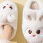 White cartoon bunny plush slippers seen from above on a foot, standard style, option photo for size 36/37