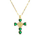 Gold tone cross pendant paved with clear cubic zirconia on a fine plated chain