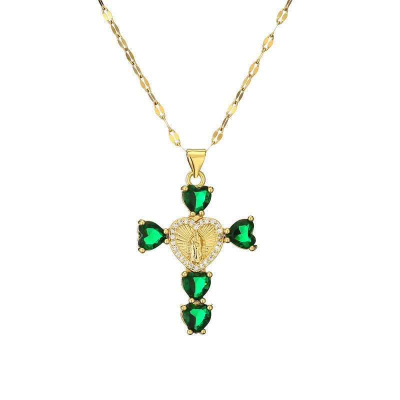 Gold tone cross pendant paved with clear cubic zirconia on a fine plated chain