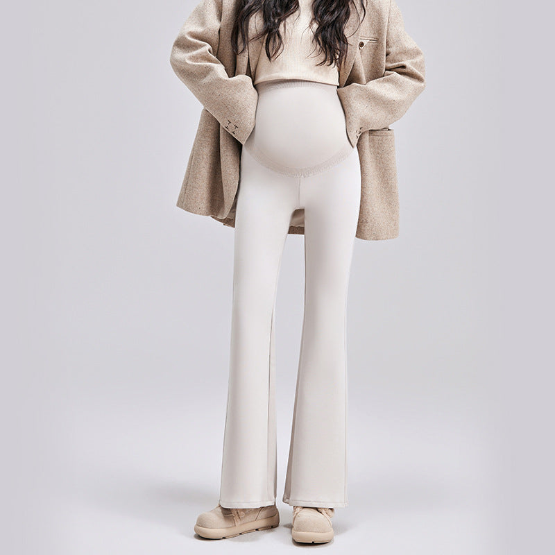Beige maternity bell-bottom pants with a high-waist belly panel, size XL option, worn with a camel coat