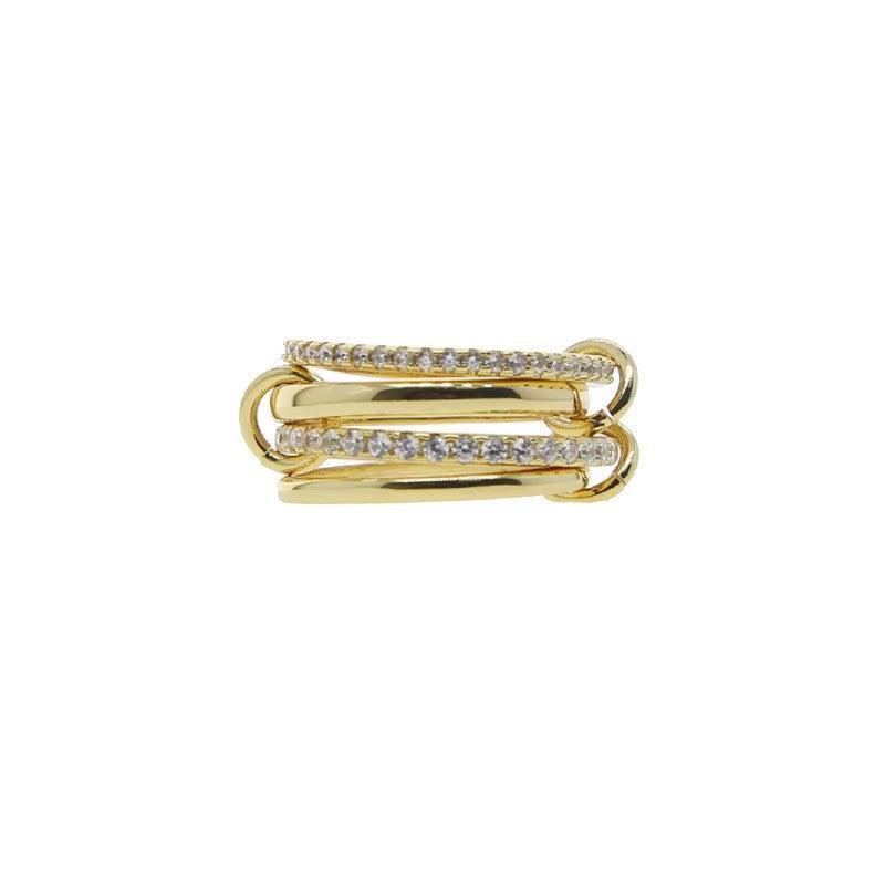 Stacked band ring shown beside thinner rings on the hand