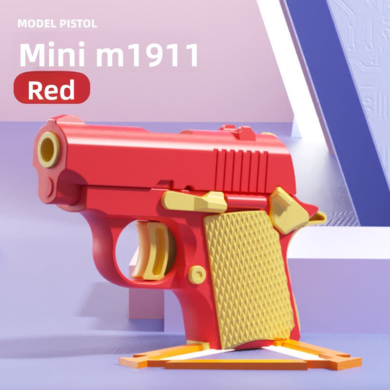 Red and yellow moulded model pistol fidget shown as a colourway option on a pastel set