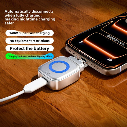 Silver USB-C charge separator plugged inline to a phone with a blue status ring light