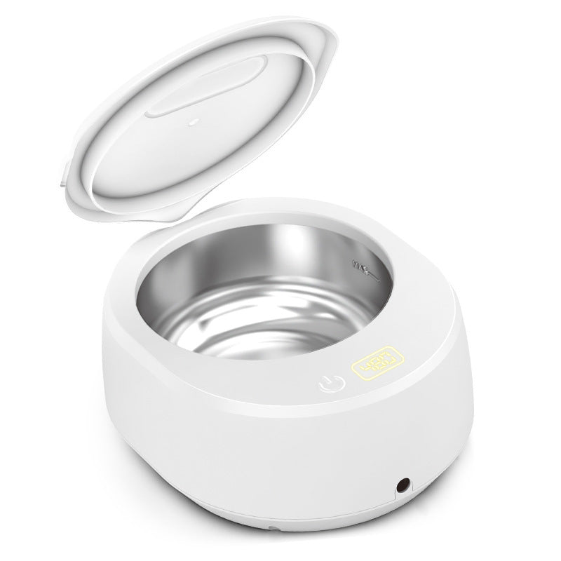 White A9 ultrasonic cleaner with the lid open showing the round stainless steel tank and controls