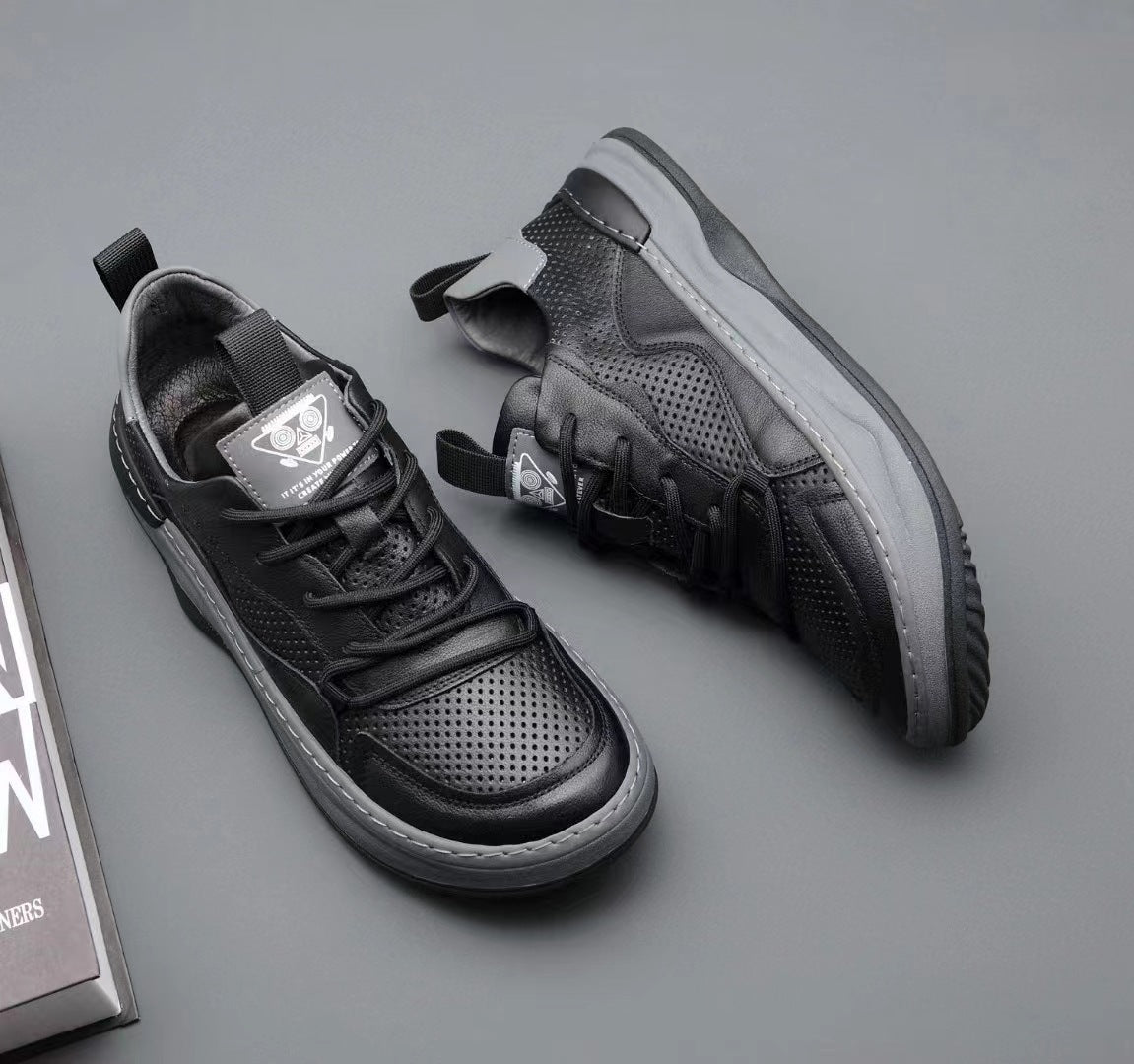 Lace up microfibre sneaker in European sizes 38 to 44, shown on a plain surface