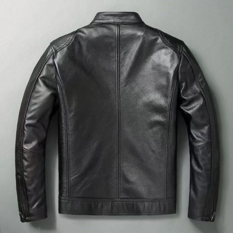 Back view of a black stand collar moto jacket with a center back seam and buckle tabs at the waist