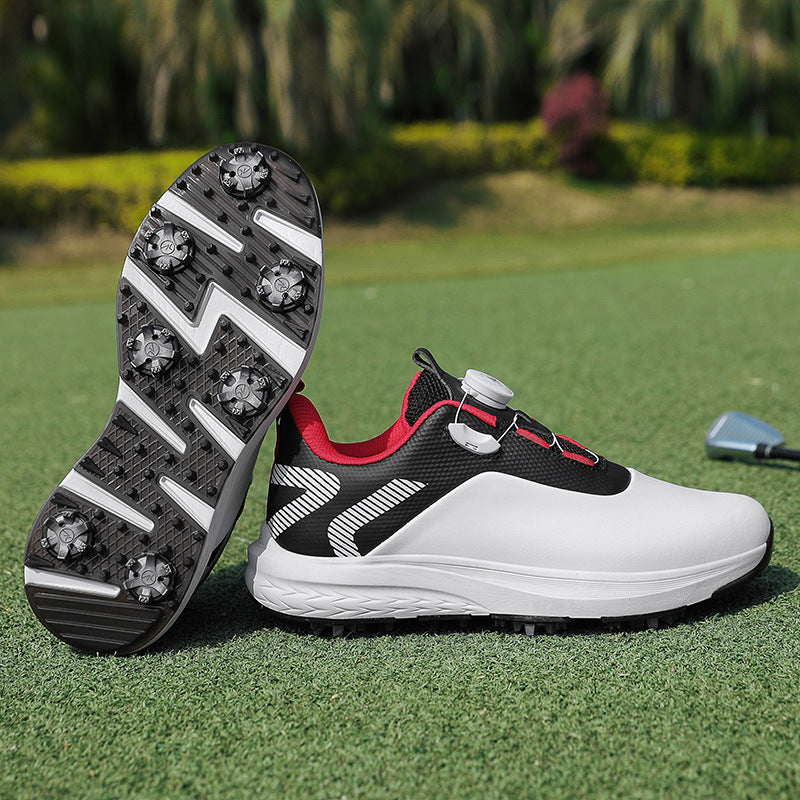 Black golf shoe with a twist dial closure and a spiked outsole with star shaped cleats
