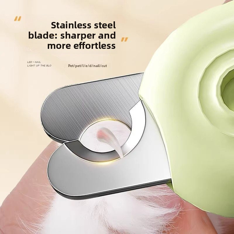 Green LED pet nail clipper shown from the side with the stainless blade and round LED lens window