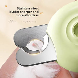 Green LED pet nail clipper shown from the side with the stainless blade and round LED lens window