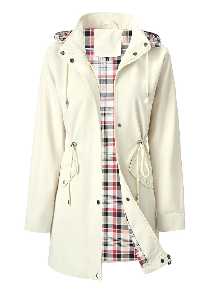 Close view of the tartan check lining inside the women's windbreaker