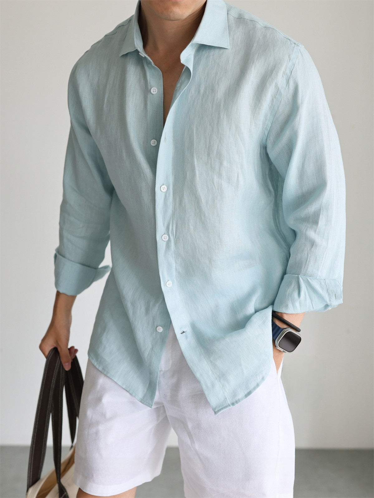 Close up of the woven pure linen fabric texture with natural flax slubs on the shirt