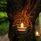 Solar candle ball lantern held in hand for scale reference