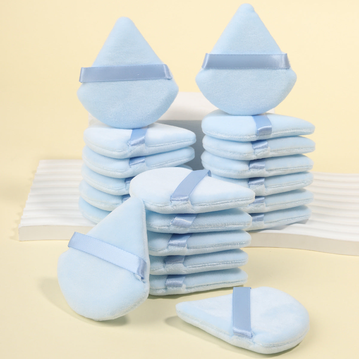 Full boxed set with foam sponges, velvet puffs, a spa headband and a facial cleansing brush