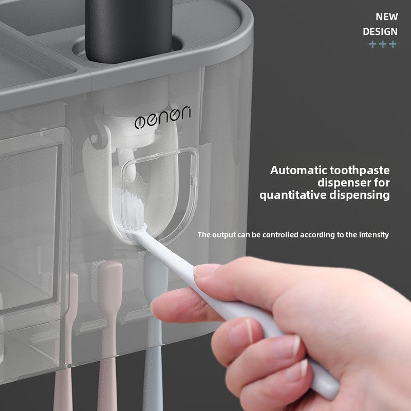 Close up of the automatic toothpaste dispenser releasing paste onto a toothbrush