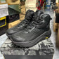 Men's mid-top hiking boot shown from the side profile