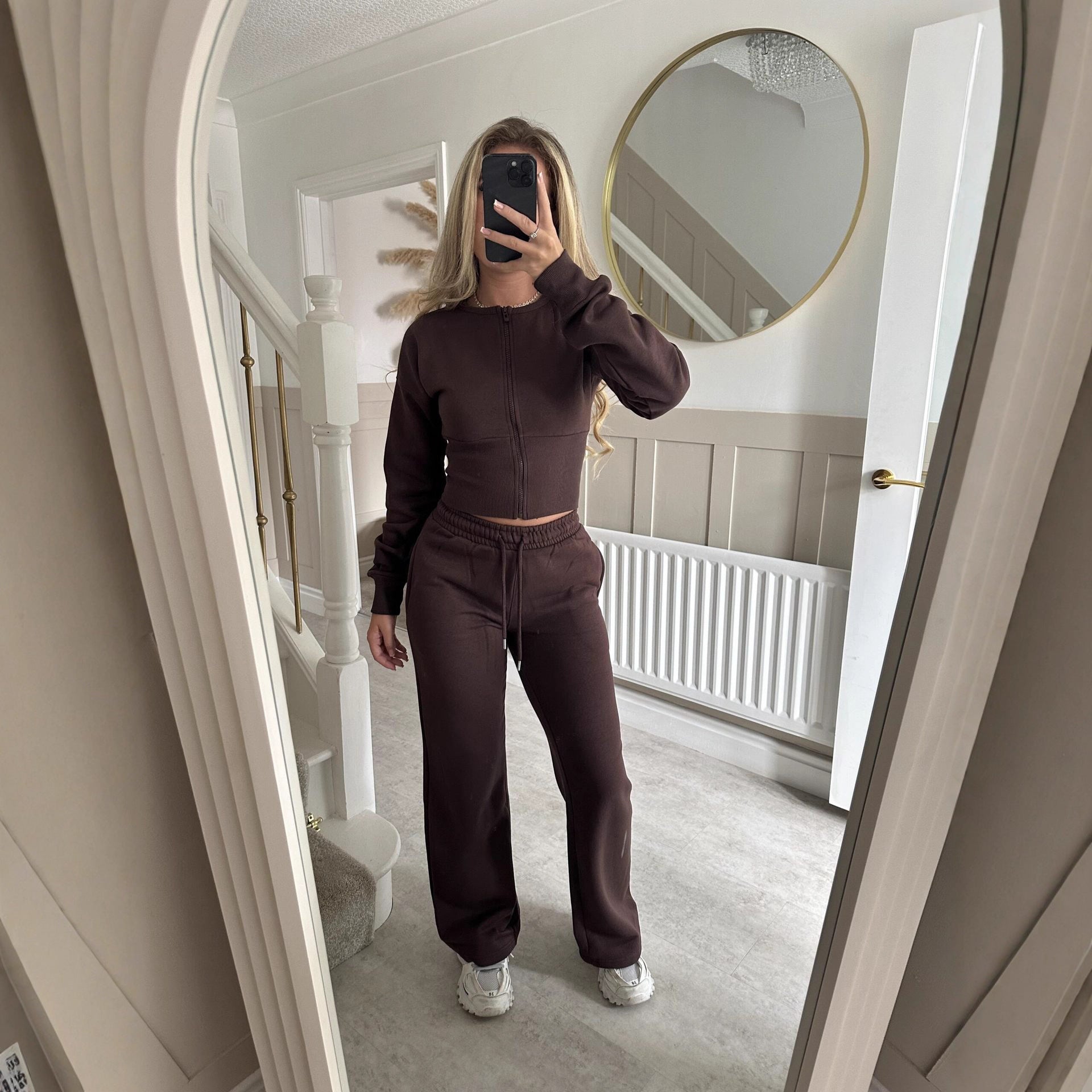 Womens two piece lounge set, a front zip jacket and straight leg drawstring pants in a soft sweat knit