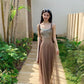 Front view of the ombre bodycon dress on a soft studio backdrop