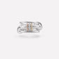 Linked stacked band ring photographed in a modern interior setting