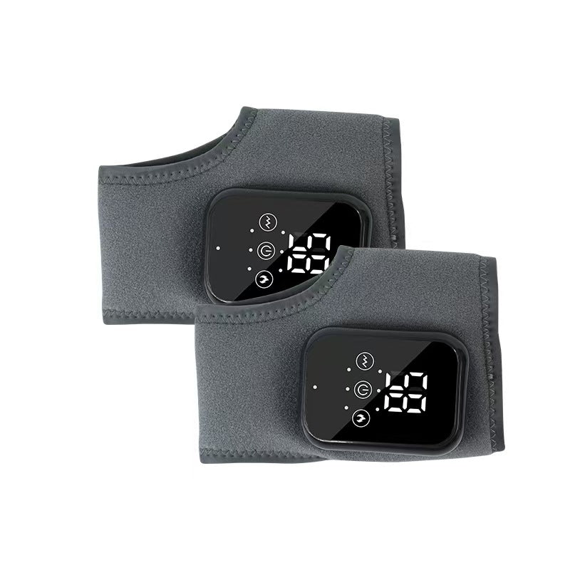 Two grey fabric ankle heating wraps with LED control pods shown stacked