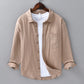 Open front styling of the linen blend shirt layered over a white t-shirt