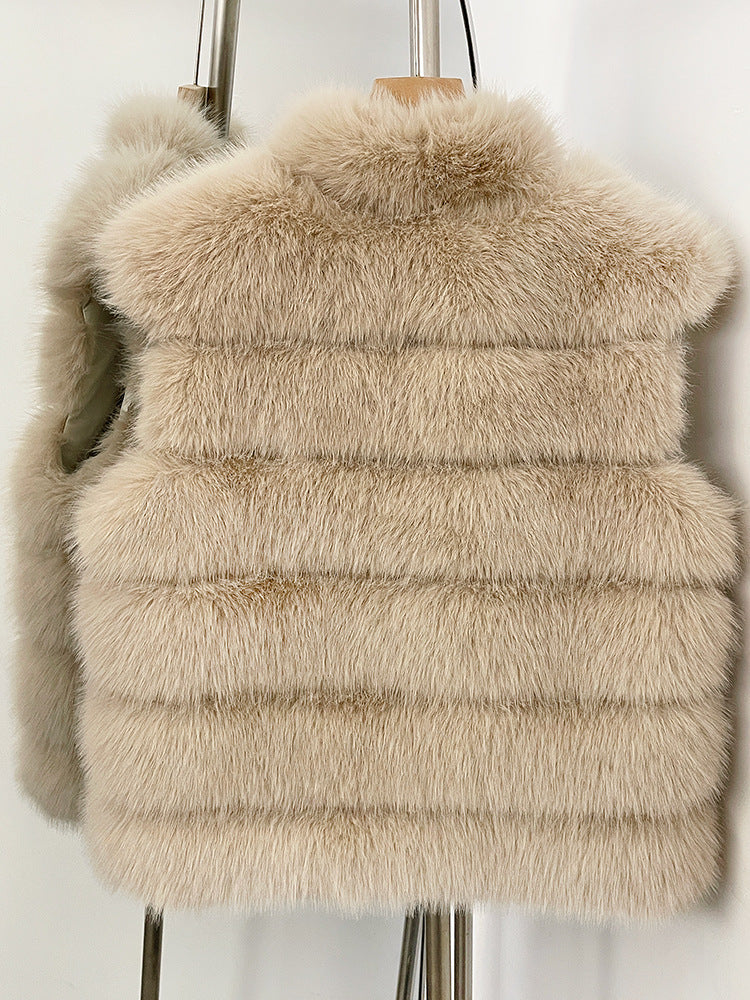 Dark Beige tiered vegan fur sleeveless vest on a hanger showing six horizontal fur tiers