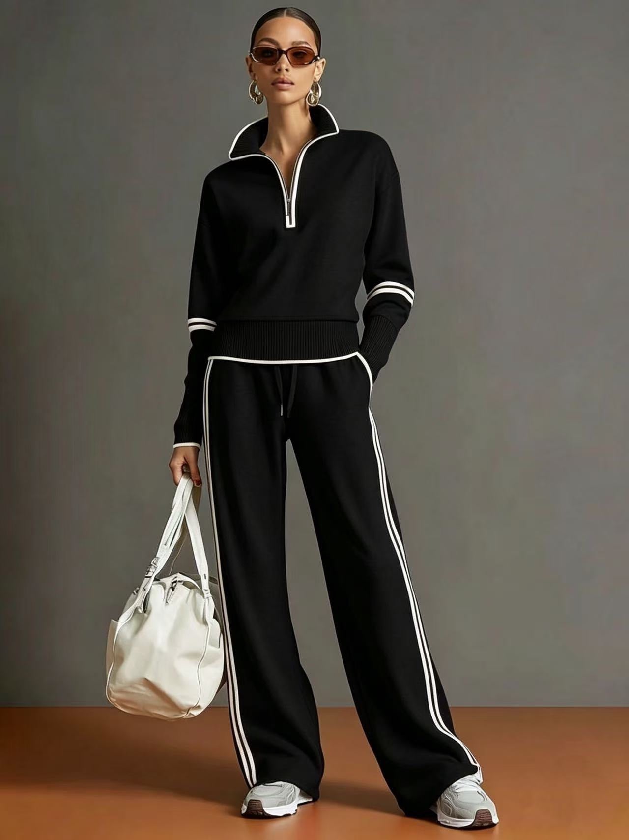 Black stand collar sweatshirt with white contrast trim and matching wide leg drawstring pants