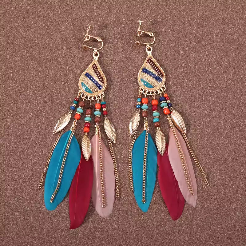 Bohemian vintage clip-on tassel drop earrings on a zinc alloy frame, handmade boho pair on white studio background