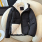 Padded winter puffer jacket with a fleece lined hood and two zippered front pockets