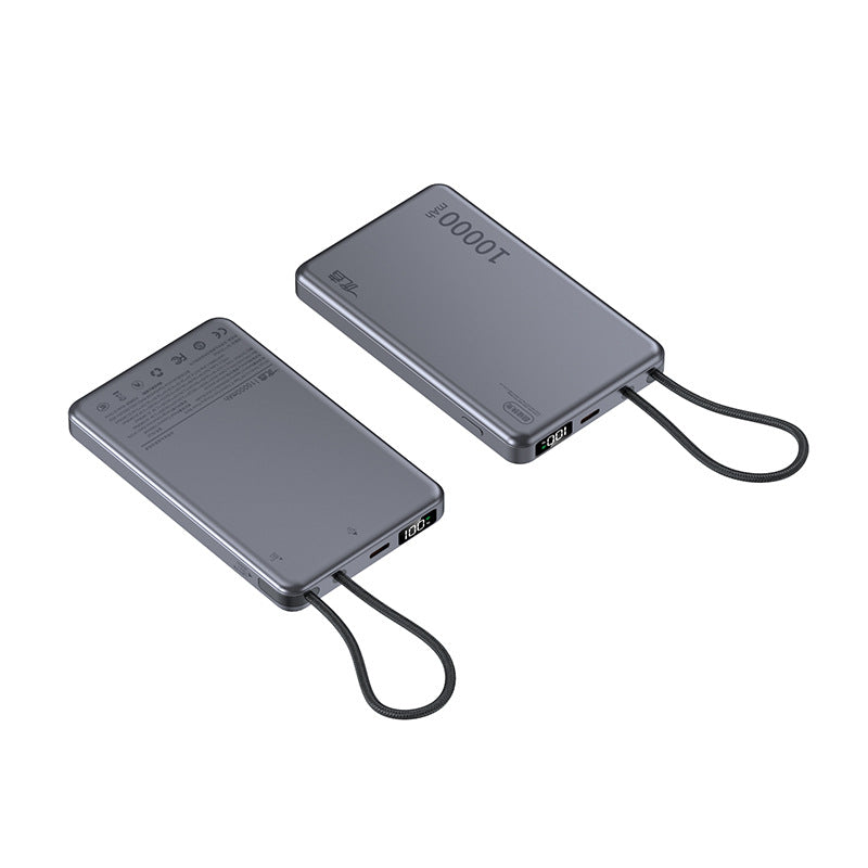 Power bank charging a phone through its built in cable with a digital battery display