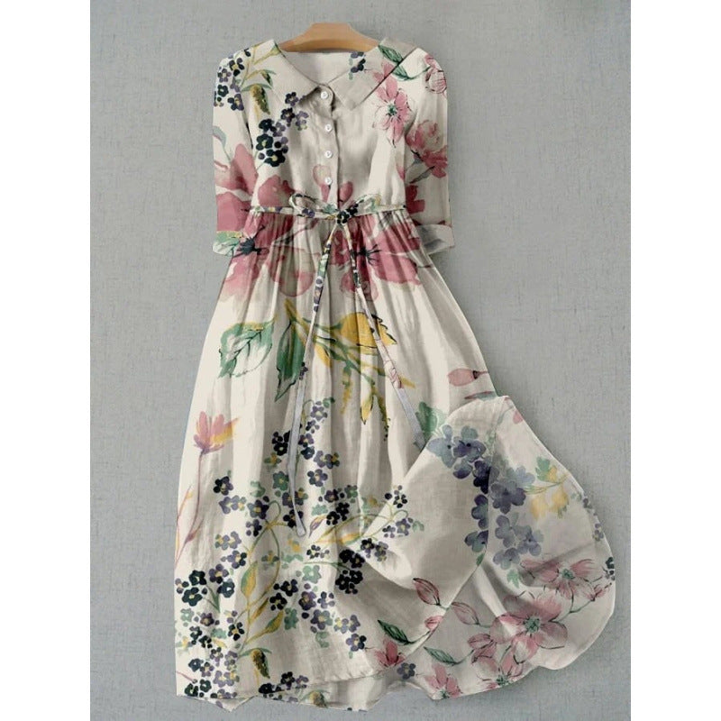 Loose polyester floral midi dress with a rounded doll collar and half button placket