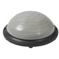Grey half dome balance trainer seen from the side, dome and rigid black base together