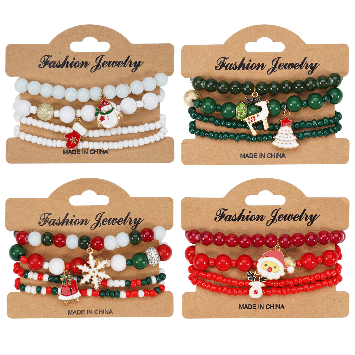 Four cardboard cards each holding a set of four Christmas bead stretch bracelets in white, green, mixed and red