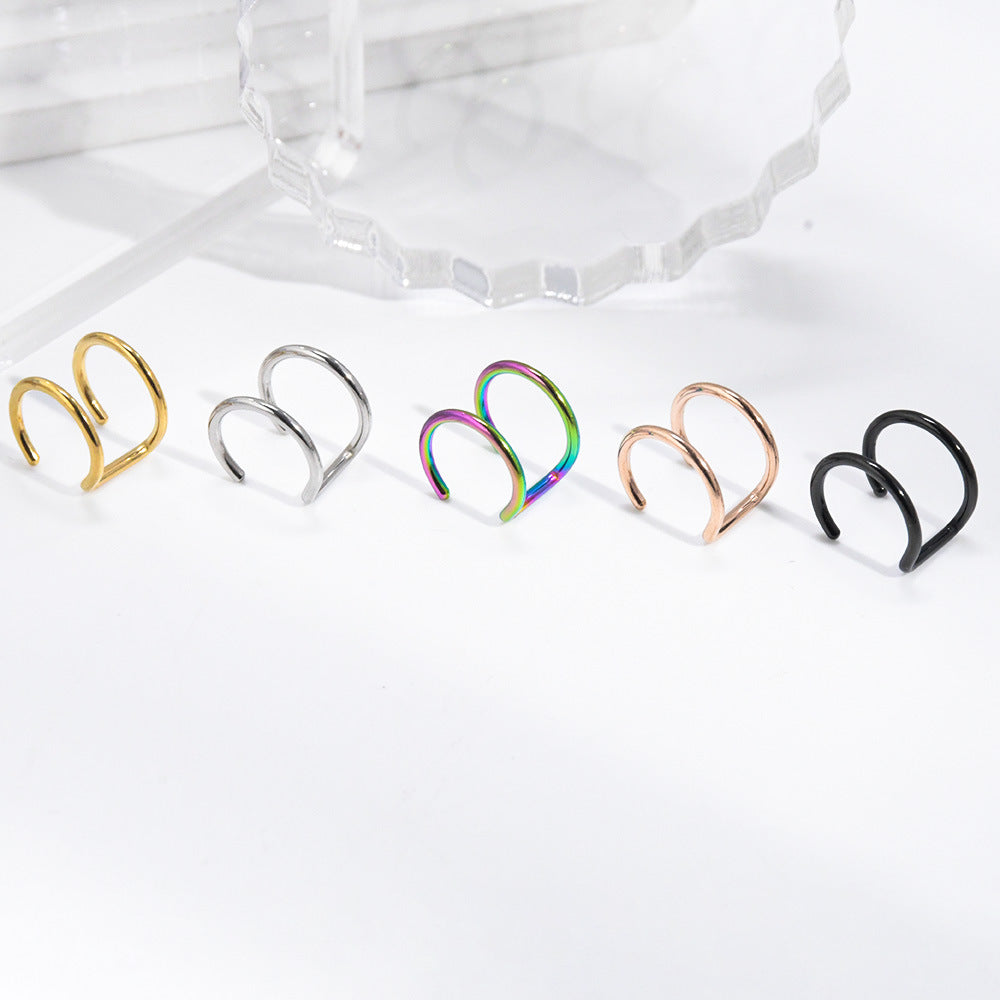 Five double line ear cuffs in gold, steel, rainbow, rose gold and black
