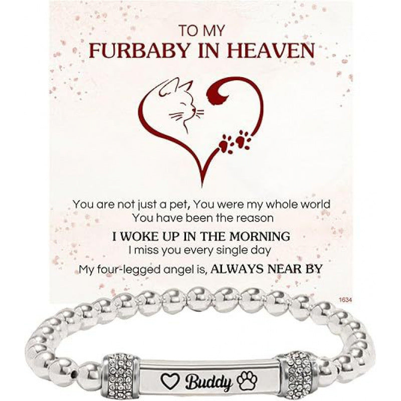 Silver bead stainless steel bracelet with an engraved bar and a cat claw accent
