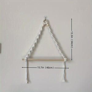 Front view of the hand-knotted macrame towel holder in natural cotton cord