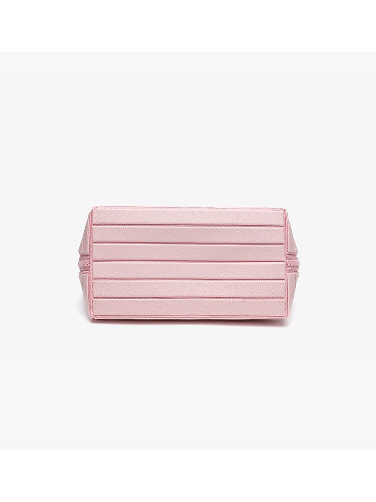 Ribbed stripe makeup and toiletry organizer case with a structured shell and top carry handle