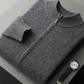 Dark grey wool knit cardigan folded flat showing the metal zip pull and ribbed collar, size S option