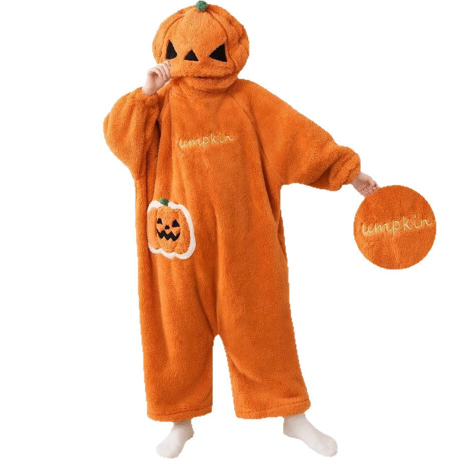 Orange pumpkin onesie with hood on a white background, holding a round embroidered Pumpkin fleece piece