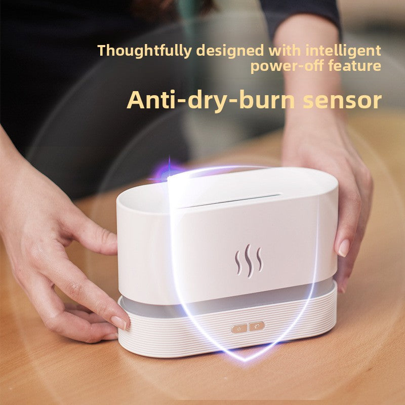 Flame effect essential oil diffuser releasing a soft warm lit mist on a table