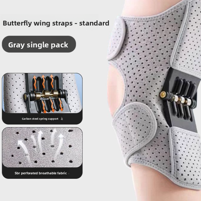 Grey perforated knee wrap worn on a leg with the coil spring panel at the side