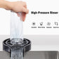 Automatic press glass rinser spraying water up into an inverted glass held over the base