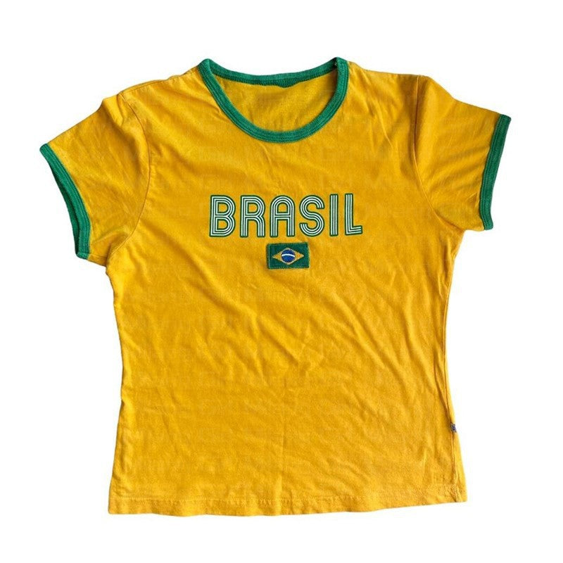 Yellow Brasil ringer tee flat lay with green neck and cuff trim