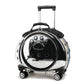 Transparent black pet carrier on wheels with a clear capsule shell, paw-print door and a black telescopic handle