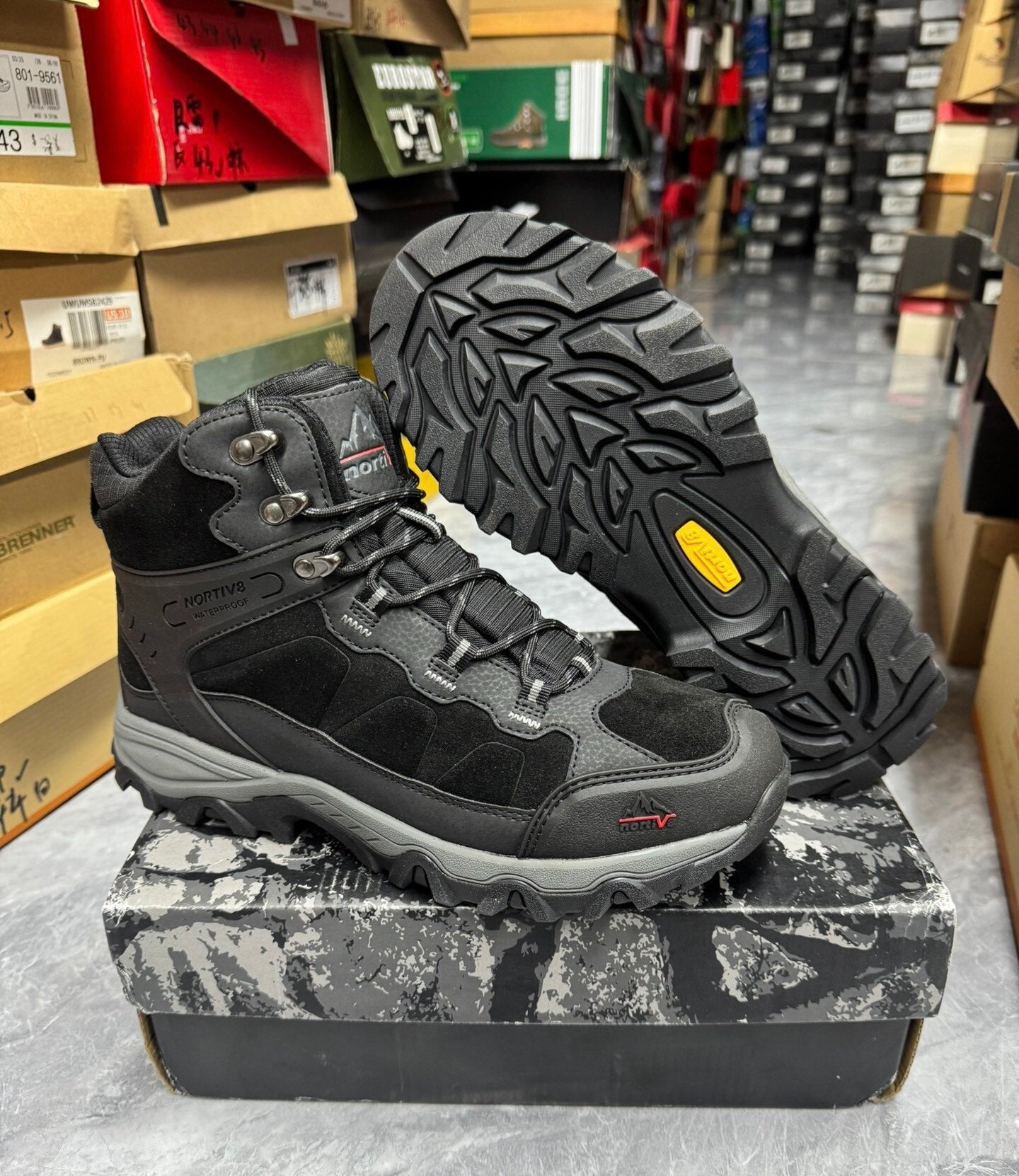 Men's mid-top hiking boot shown from the side profile
