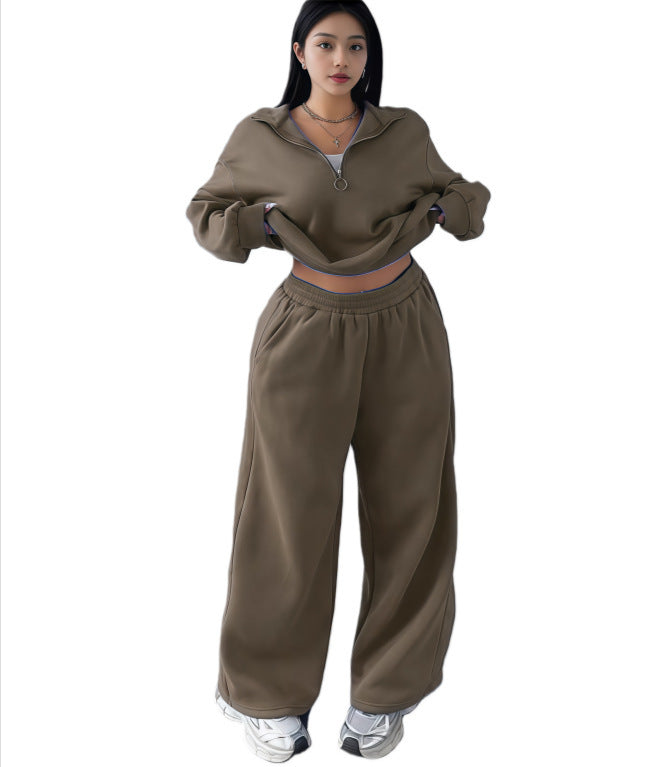 Army green cropped half-zip sweatshirt and wide-leg sweatpants set on a model, size XL option