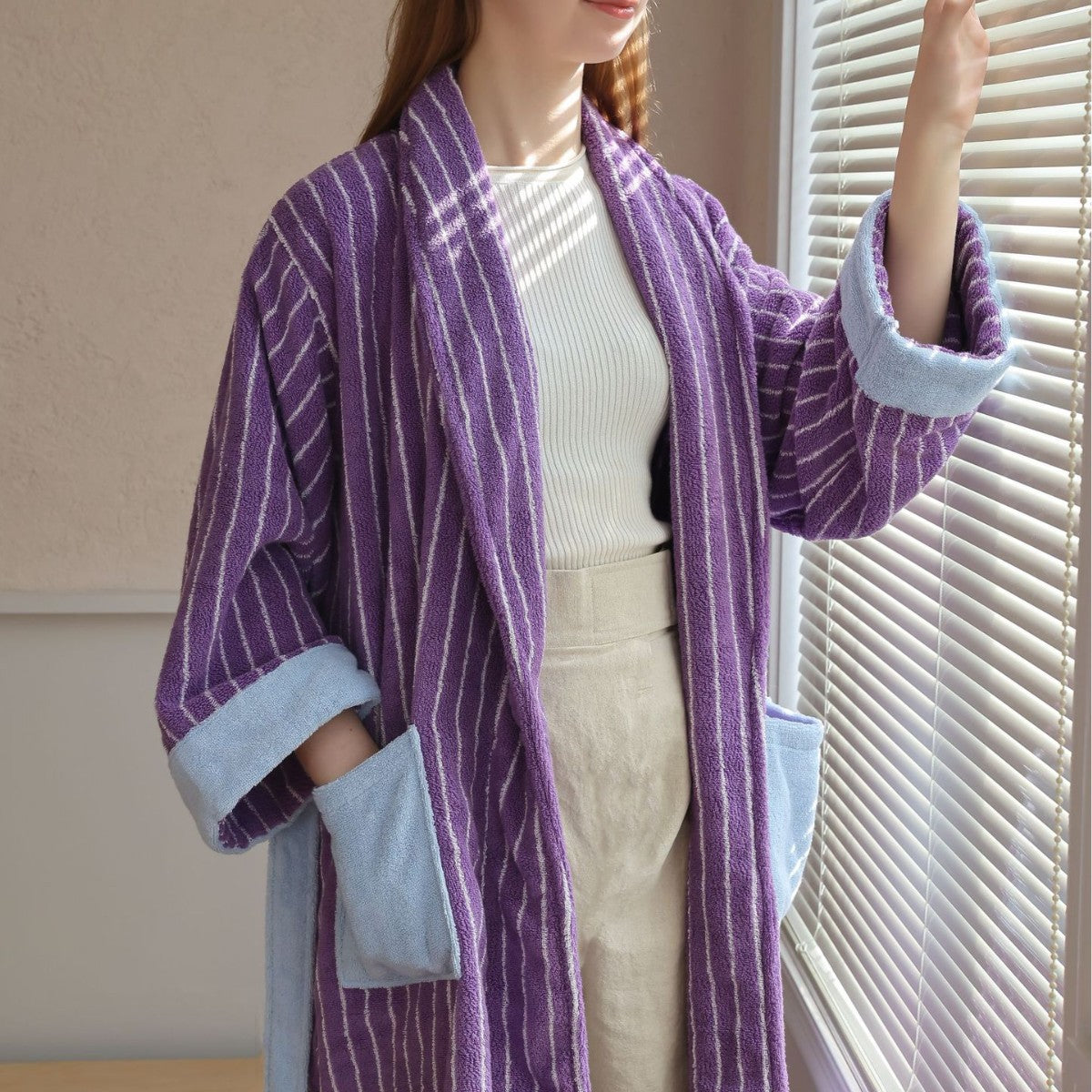 Open front purple striped cotton terry bathrobe with light blue trim and a shawl collar