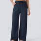 Close-up of woven linen fabric and drawstring tie on yoga pants