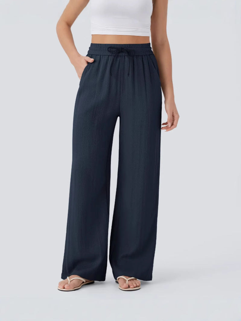 Close-up of woven linen fabric and drawstring tie on yoga pants