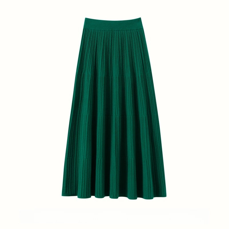 Emerald green ribbed knit tiered midi skirt with a wide ribbed waistband, flat front view on white