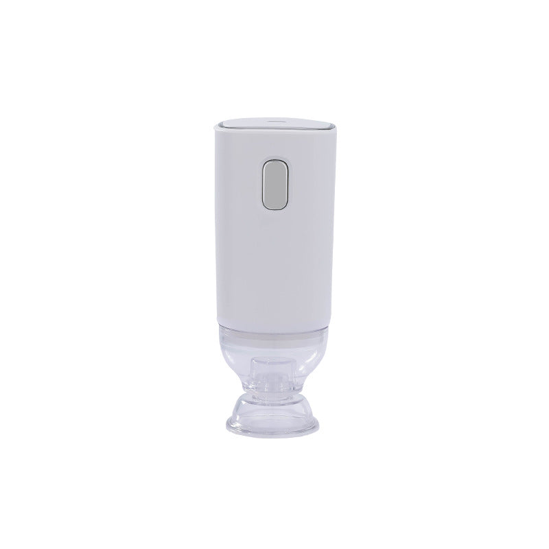 White cordless handheld vacuum sealer pump with clear valve nozzle at the base